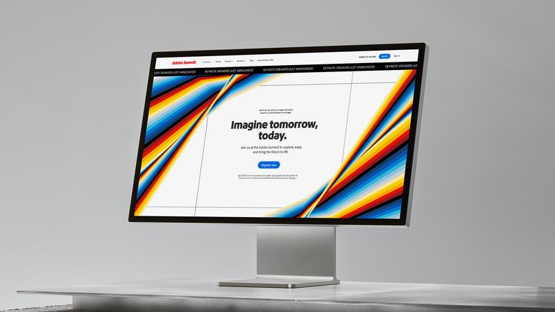 Adobe Summit Imagine tomorrow today website displayed on a desktop monitor