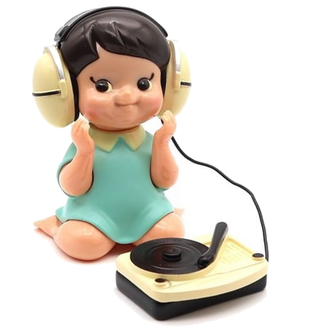Vintage headphone doll seated beside a record player